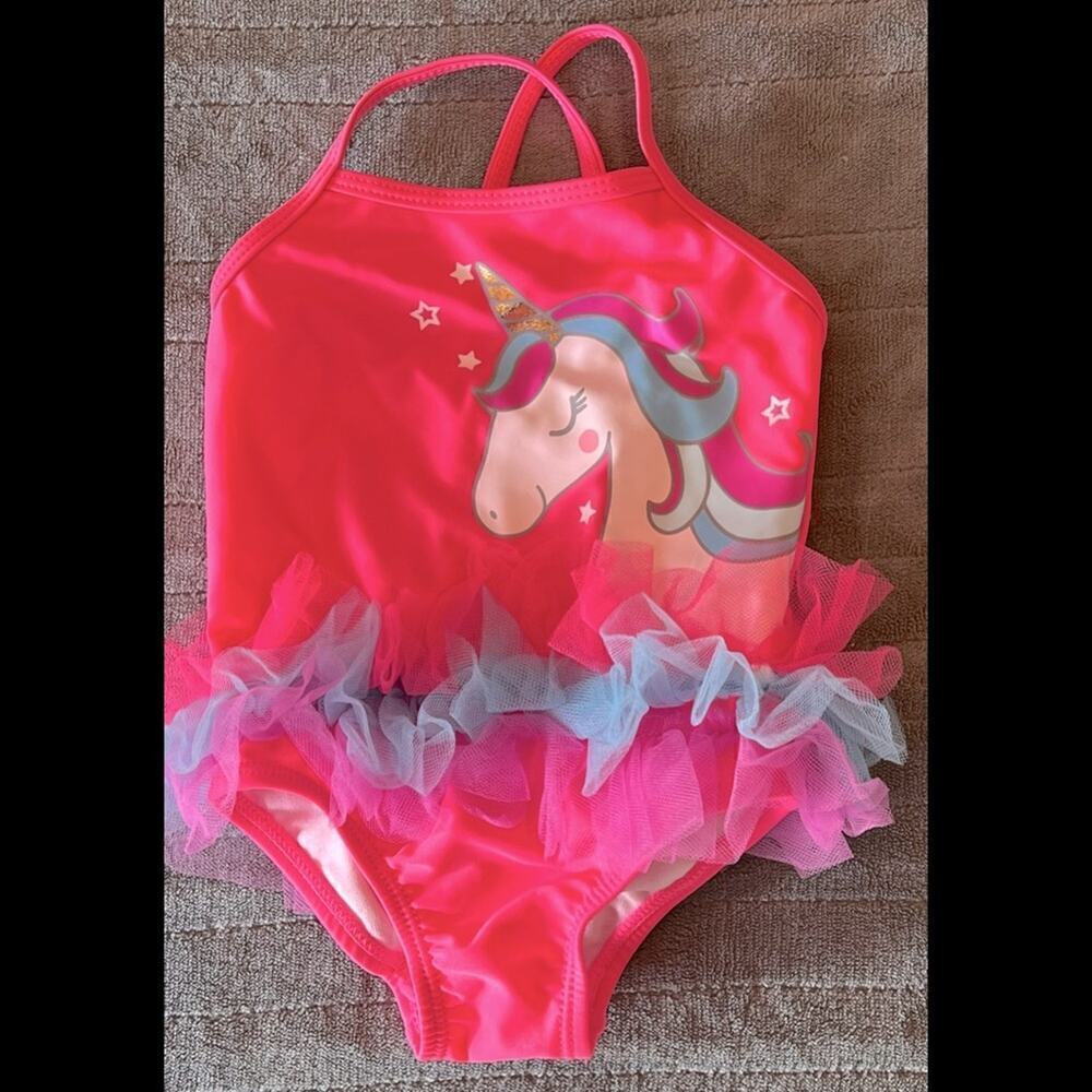 Wonder Nation pink unicorn with rainbow ruffles swimsuit in size 6-9 months.